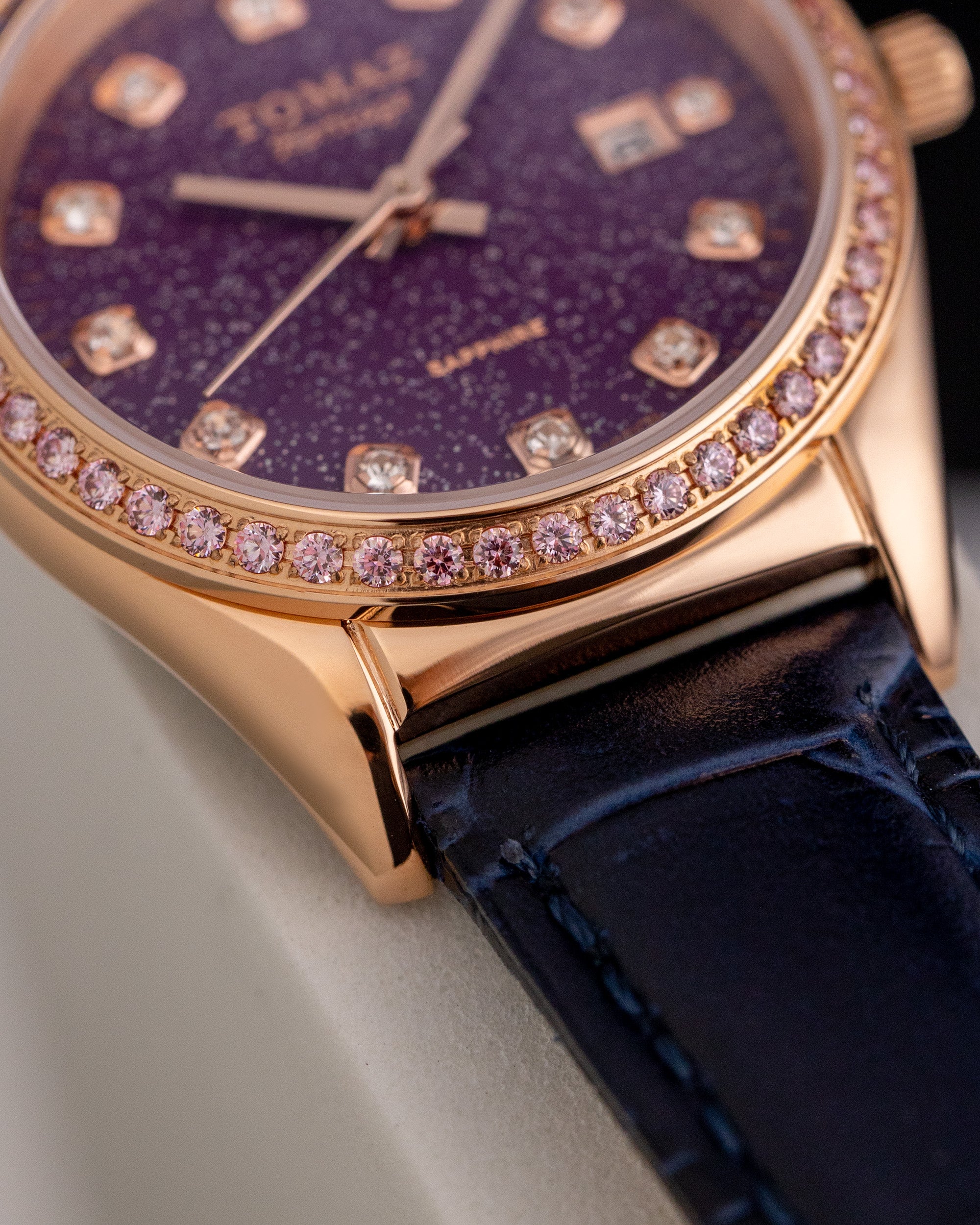 Jam Tangan Wanita Tomaz TQ017L-D29 Stardust (Emas Mawar/Ungu) dengan Swarovski Ungu (Tali Kulit Buluh Tentera Laut)